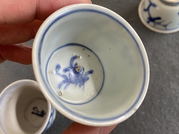 Eight Chinese mostly blue and white wine and tea cups, Ming