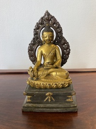A Sino-Tibetan gilt and silvered copper alloy Medicine Buddha or Bhaishajyaguru, 19th C.