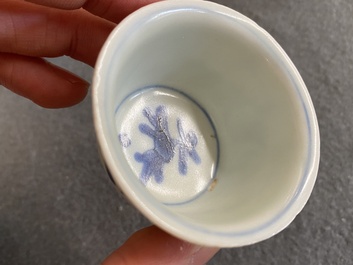 Eight Chinese mostly blue and white wine and tea cups, Ming