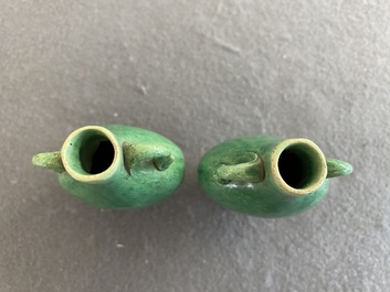 A pair of Chinese green-glazed miniature vases, Ming