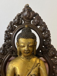 A Sino-Tibetan gilt and silvered copper alloy Medicine Buddha or Bhaishajyaguru, 19th C.