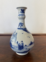 A Chinese blue and white bottle vase with figures in a landscape, Kangxi
