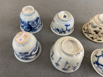 Eight Chinese mostly blue and white wine and tea cups, Ming
