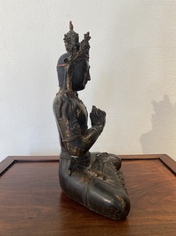 A large Sino-Tibetan gilt-lacquered bronze Budddha, 19/20th C.