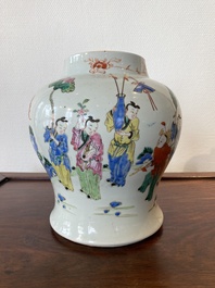 A Chinese famille rose 'playing boys' vase on a fine carved wooden stand, Yongzheng