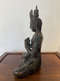 A large Sino-Tibetan gilt-lacquered bronze Budddha, 19/20th C.