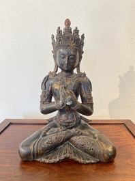 A large Sino-Tibetan gilt-lacquered bronze Budddha, 19/20th C.