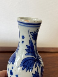 A Chinese blue and white double gourd vase with a scholar and two students, Transitional period