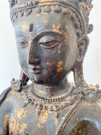 A large Sino-Tibetan gilt-lacquered bronze Budddha, 19/20th C.