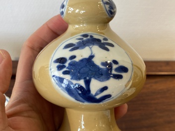 Two Chinese blue and white bowls, a small plate and a caf&eacute;-au-lait ground sprinkler, Kangxi