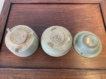 A Chinese Longquan celadon 'twin fish' dish and two censers, Song and/or later