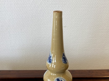 Two Chinese blue and white bowls, a small plate and a caf&eacute;-au-lait ground sprinkler, Kangxi
