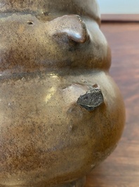 A Chinese monochrome brown-glazed vase, Song