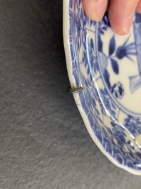 Two Chinese blue and white bowls, a small plate and a caf&eacute;-au-lait ground sprinkler, Kangxi