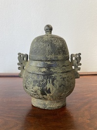 A Chinese bronze 'you' ritual wine ewer, Zhou, ca. 11th-9th C. b.C.