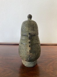 A Chinese bronze 'you' ritual wine ewer, Zhou, ca. 11th-9th C. b.C.