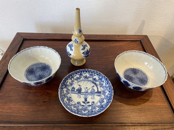 Two Chinese blue and white bowls, a small plate and a caf&eacute;-au-lait ground sprinkler, Kangxi