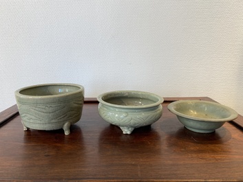 A Chinese Longquan celadon 'twin fish' dish and two censers, Song and/or later