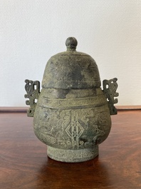 A Chinese bronze 'you' ritual wine ewer, Zhou, ca. 11th-9th C. b.C.