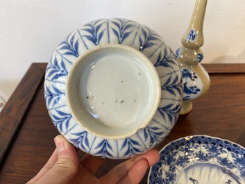Two Chinese blue and white bowls, a small plate and a caf&eacute;-au-lait ground sprinkler, Kangxi