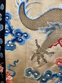 A large Chinese gold-thread-embroidered silk panel with an imperial dragon, 19th C.