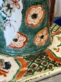 A pair of Chinese hexagonal famille verte vases with floral panels, Kangxi