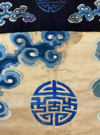 A large Chinese gold-thread-embroidered silk panel with an imperial dragon, 19th C.