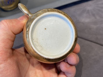 Onze soucoupes et dix tasses en porcelaine de Chine monogramm&eacute;es 'PM' sur fond dor&eacute;, Yongzheng/Qianlong