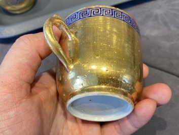 Onze soucoupes et dix tasses en porcelaine de Chine monogramm&eacute;es 'PM' sur fond dor&eacute;, Yongzheng/Qianlong