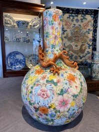 A Chinese famille rose 'millefleurs' bottle vase, Qianlong mark, Republic