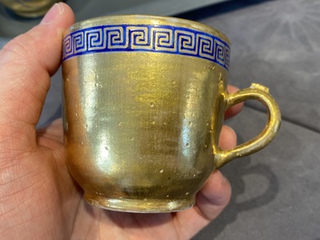Onze soucoupes et dix tasses en porcelaine de Chine monogramm&eacute;es 'PM' sur fond dor&eacute;, Yongzheng/Qianlong