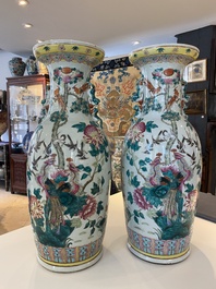 A pair of Chinese famille rose vases with peacocks and phoenixes, 19th C.