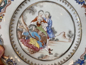 A pair of fine Chinese famille rose plates with a musician playing in front of a couple, Qianlong