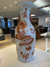 A Chinese iron-red 'Buddhist lions' vase, 19th C.