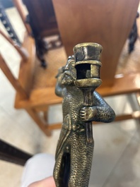 A rare bronze 'wild man' candlestick, Flanders or Germany, 15/16th C.