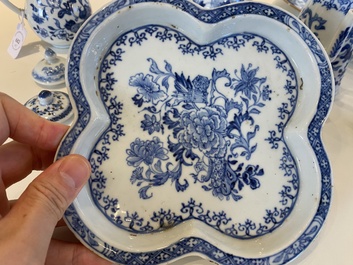 A rare Chinese blue and white set of two jugs and two casters on stand, Qianlong