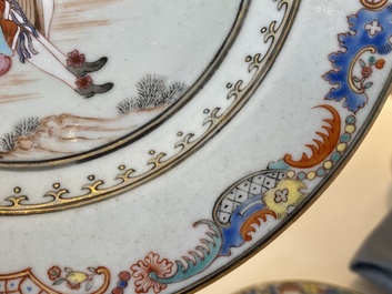 A pair of fine Chinese famille rose plates with a musician playing in front of a couple, Qianlong