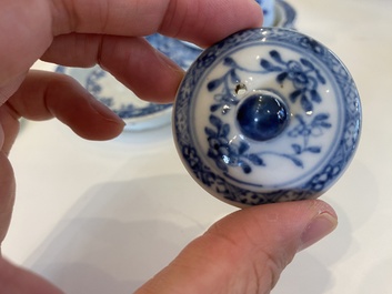 A rare Chinese blue and white set of two jugs and two casters on stand, Qianlong