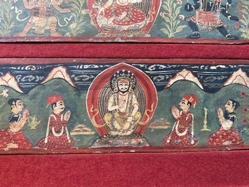 Eight tsaklis and three painted wood book covers, Tibet, 19th C.