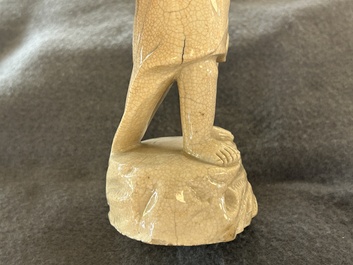 A Chinese monochrome soft paste sculpture of Adam, Kangxi