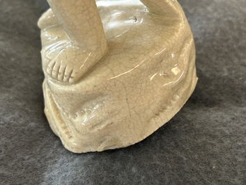 A Chinese monochrome soft paste sculpture of Adam, Kangxi