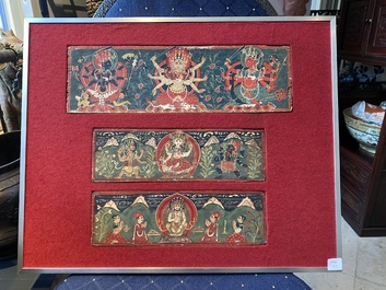Eight tsaklis and three painted wood book covers, Tibet, 19th C.