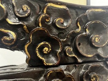 A large Chinese lacquered wooden stand in the shape of a three-legged toad, Ming