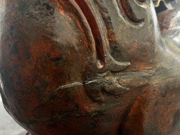 A large Chinese lacquered wooden stand in the shape of a three-legged toad, Ming