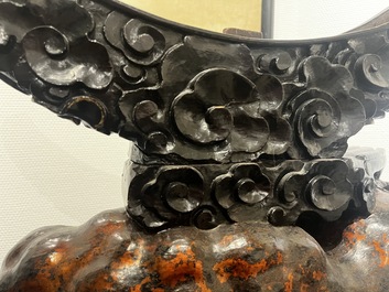 A large Chinese lacquered wooden stand in the shape of a three-legged toad, Ming
