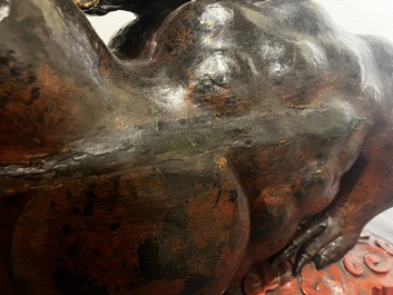 A large Chinese lacquered wooden stand in the shape of a three-legged toad, Ming