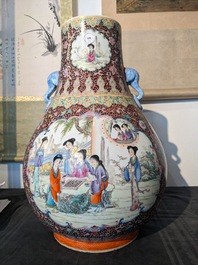A Chinese famille rose 'hu' vase and a pair of fish bowls, 20th C.