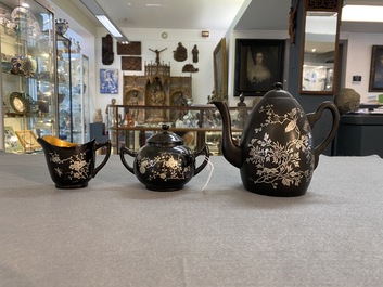 Two Chinese black Fuzhou or Foochow lacquer coffee services on trays, Republic