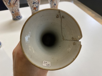 A Chinese grisaille garniture of five 'phoenix' vases, Kangxi/Yongzheng