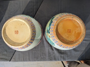 A Chinese famille rose 'hu' vase and a pair of fish bowls, 20th C.